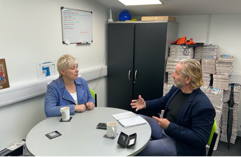 Lia Nici MP (Left) talking with Sean Cahill (Right)