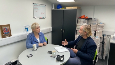 Lia Nici MP (Left) talking with Sean Cahill (Right)